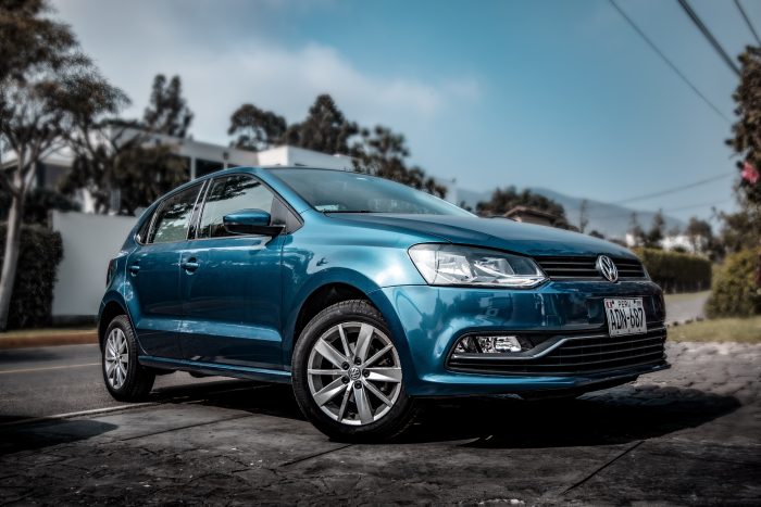 A photo of a shiny volkswagen which has just been cleaned with a spot free car washing system