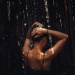 WOman showering in clean water