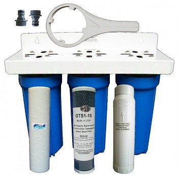 An image of a 3 canister 10" water filter housing, 3 filters, a filter spanner, and two connectors. In front of the housing are three filters, the GTS1-10, a polyphosphate filter, and a sediment filter.