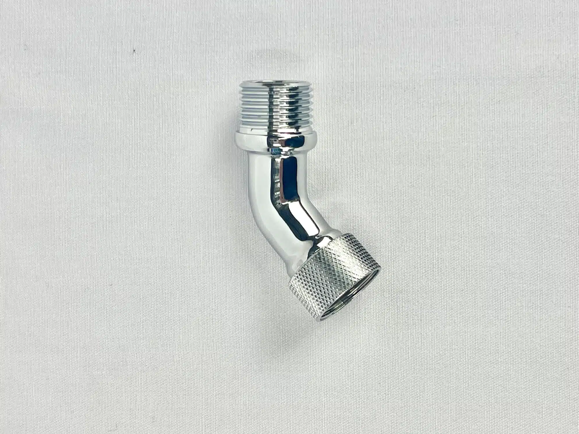 Chromed Brass 45 Degree Angle Elbow that has Swivel Lock Nut.