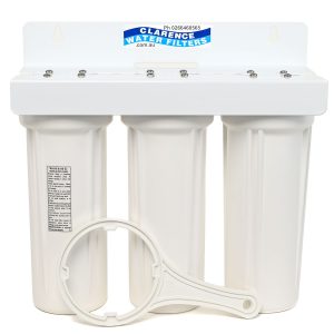 Triple QMP 10 inch by 2 point 5 inch water filter housings on a white bracket with spanner